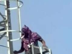 जमीन विवाद में टॉवर पर चढ़ी युवती, पुलिस के समझाने पर उतरी