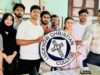 शारिक ने सहपाठियों के साथ भेंट किया हेड ऑफ द कॉमर्स डिपार्टमेंट को कालीन